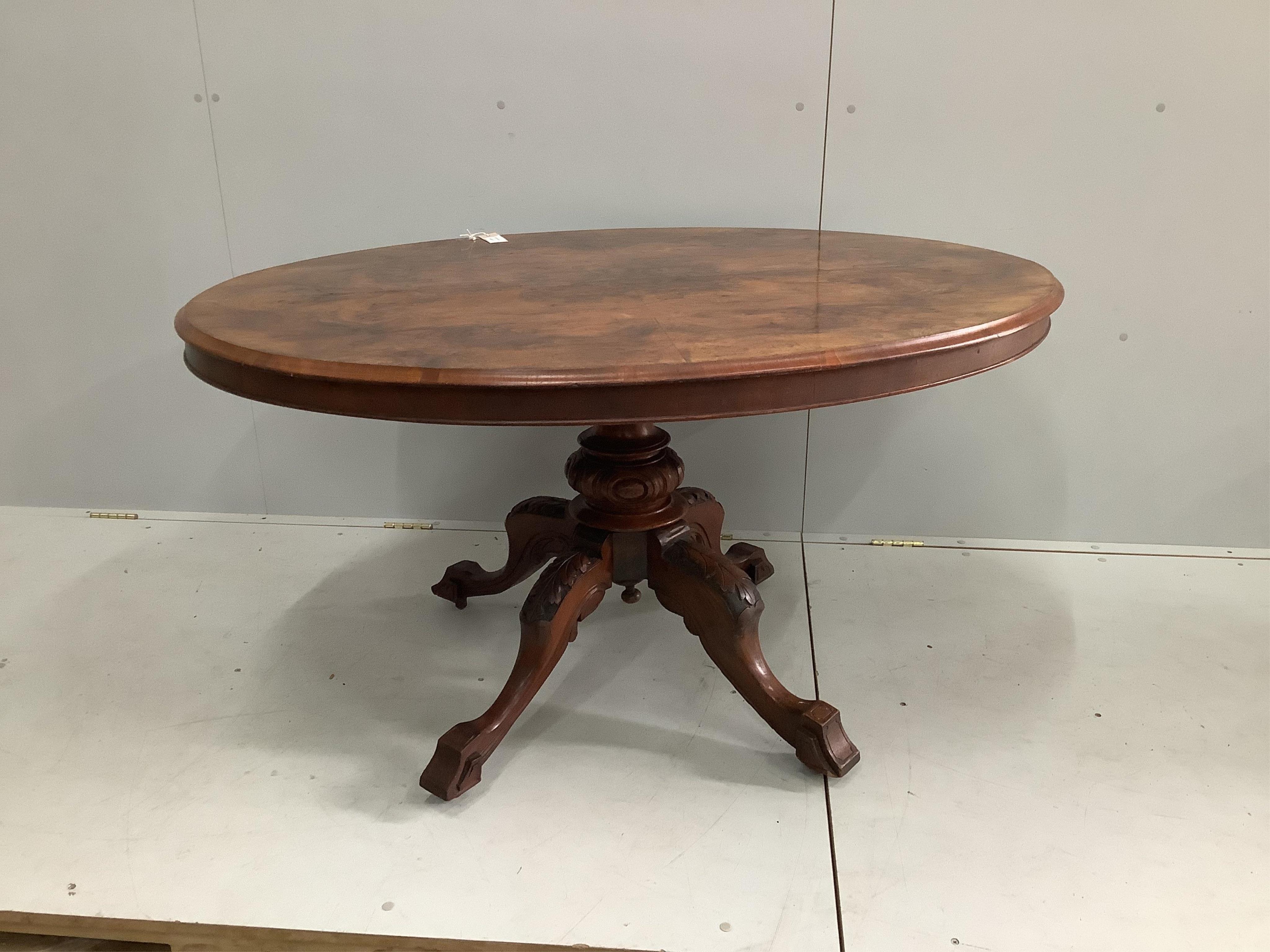 A Victorian figured walnut oval loo table, width 130cm, depth 100cm, height 70cm. Condition - fair